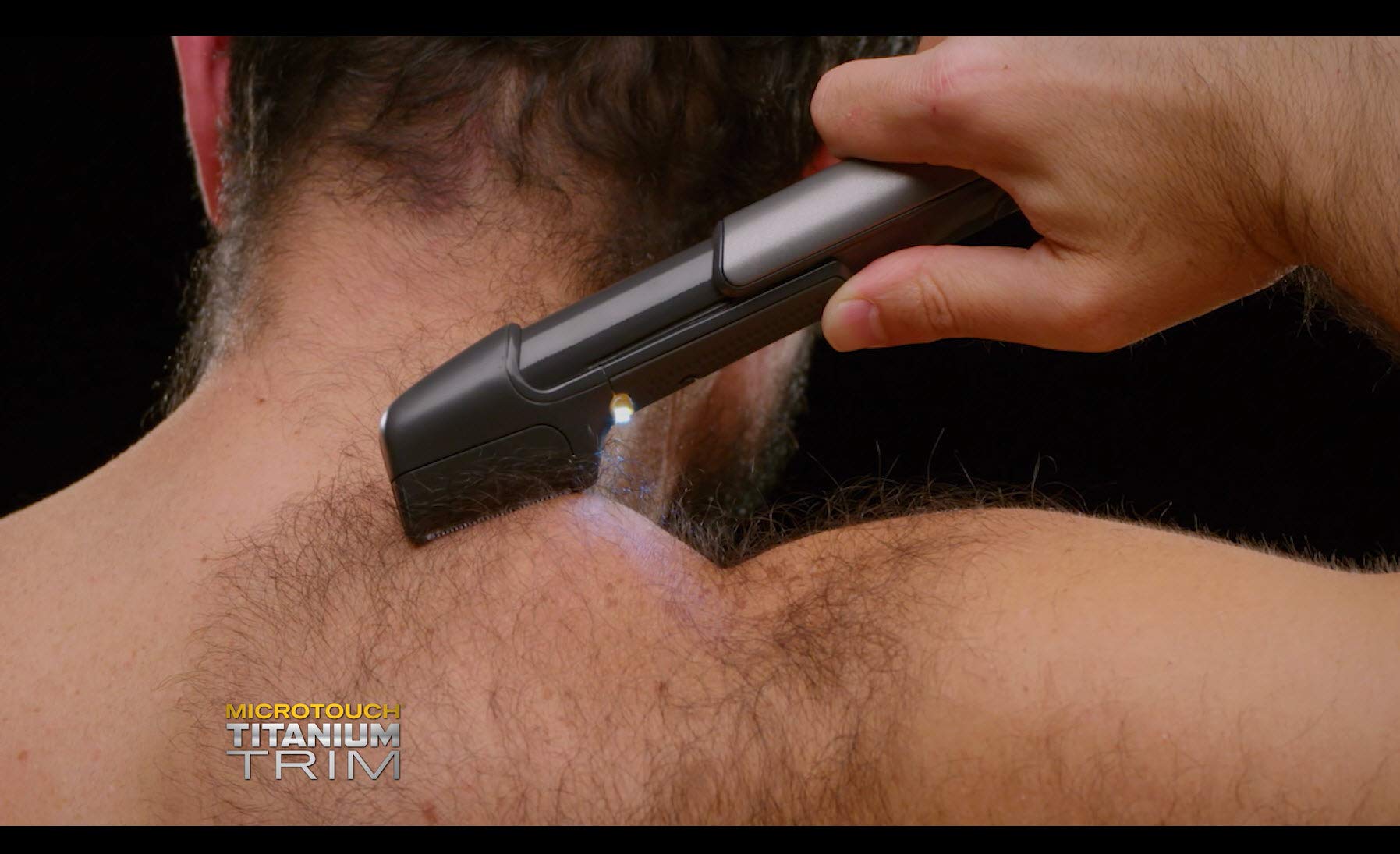 MicroTouch Titanium Trim guardia de piel para aseo suave en zonas sensibles.