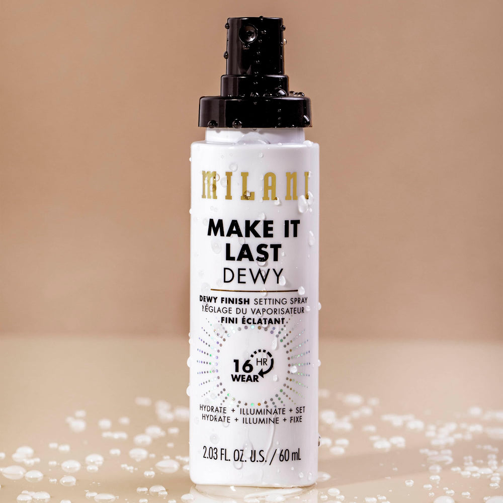 Milani Make It Dewy setting spray applied to lock in makeup.