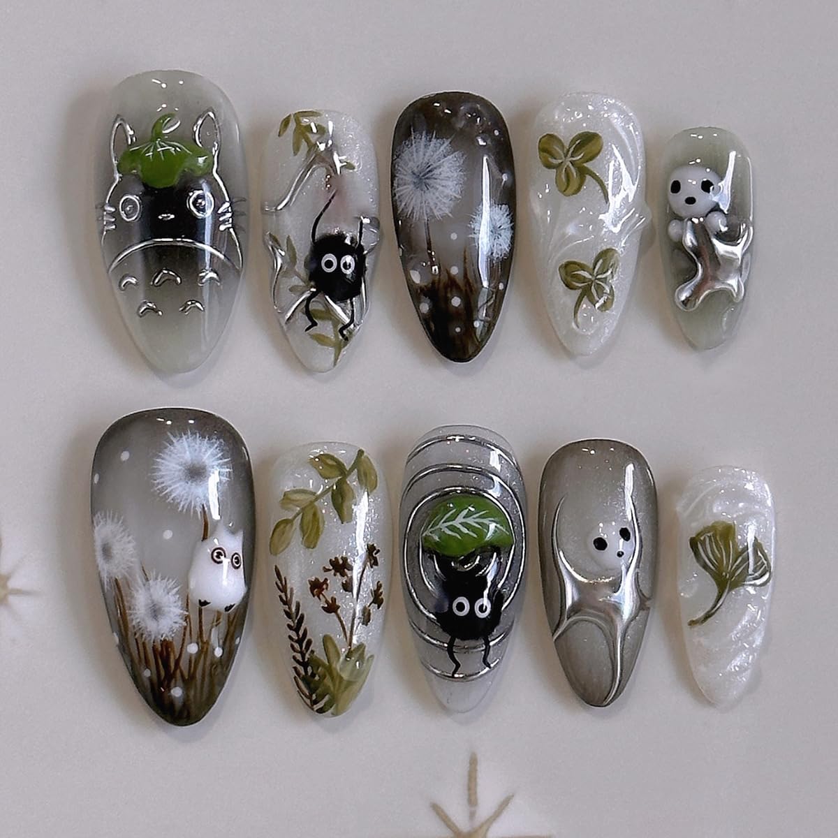 Uñas falsas MINGCHUN claras en almendra corta con diseño diente de león para elegancia diaria.
