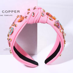 MOLOCH diadema corazón rosa con detalles brillantes, ideal para conciertos.