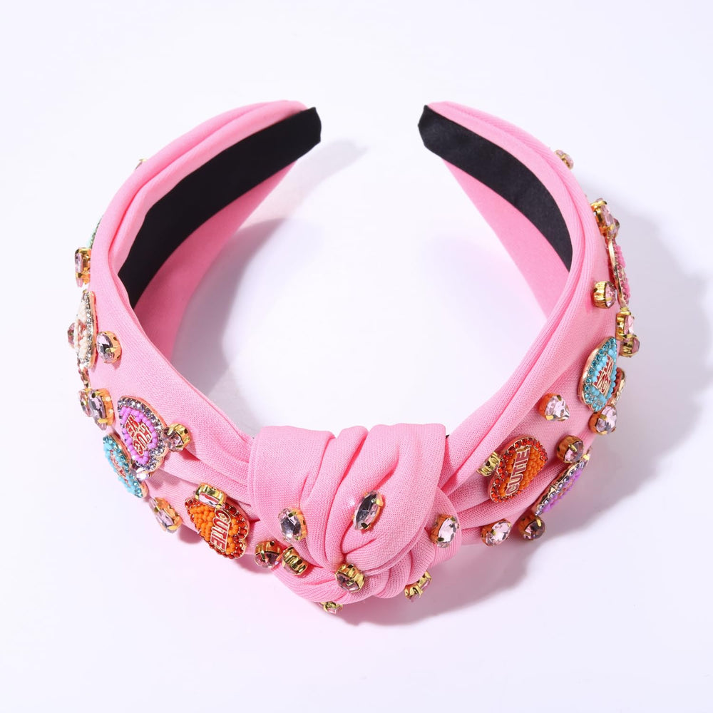 MOLOCH diadema con corazón rosa añade un toque romántico a cualquier conjunto.