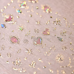 Namrec Valentine: diseño lazo dorado en uñas, decoración duradera.