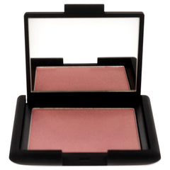 NARS Orgasm: blush avec effet lumineux durable pour un teint radieux.