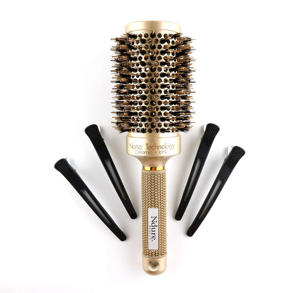 Ndure Beauty: 4 clips incluidos para sujetar secciones del cabello.