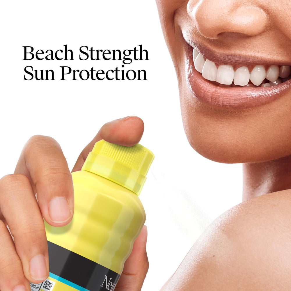 Neutrogena Beach Defense Spray absorción rápida, lista para usar sin dejar grasa.