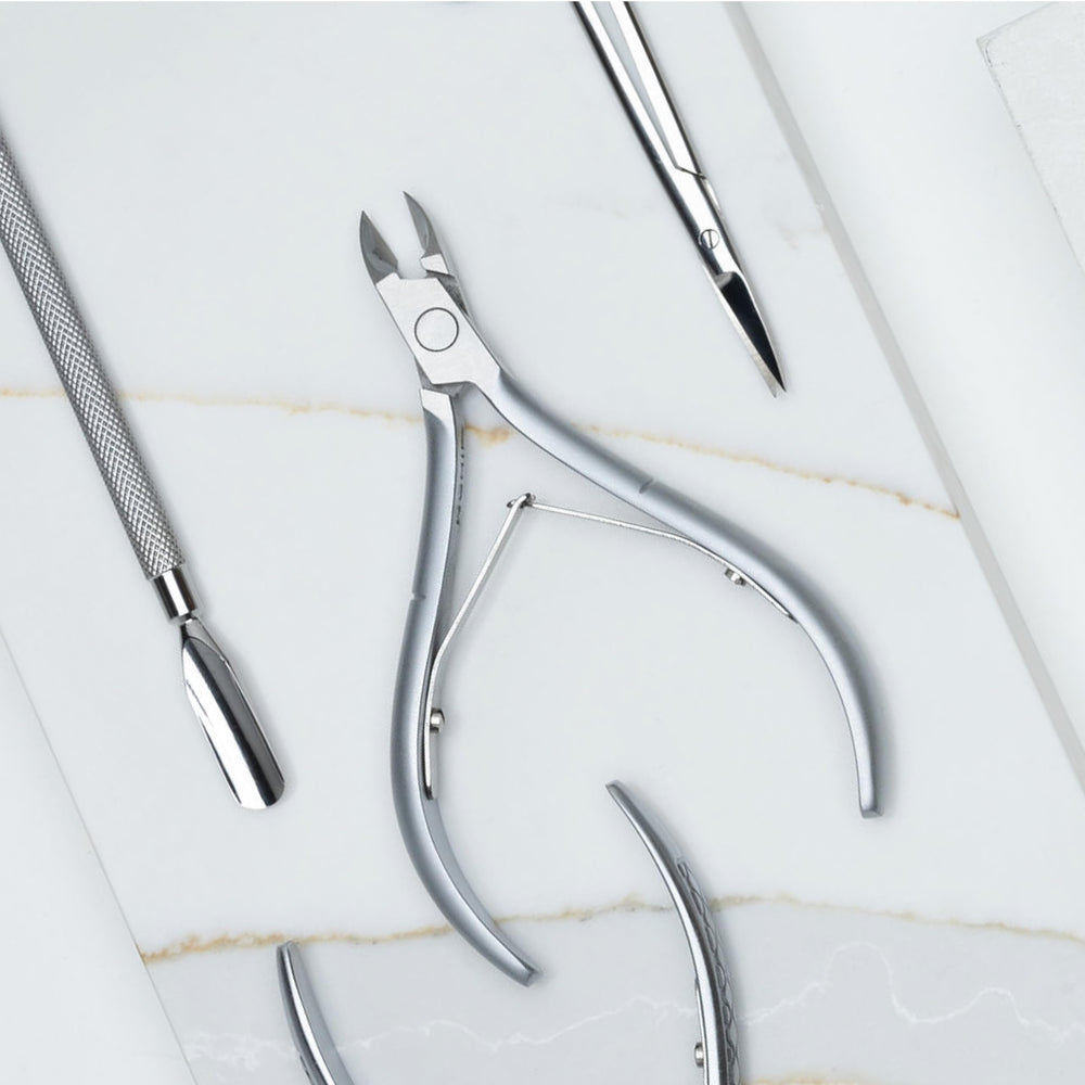 NGHIA Cortacuticulas D-07 mandibula 14 diseno ergonomico para uso comodo.