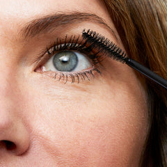 No7 Age Defying Eye Mascara wand in use with smudge-free wear