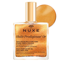 Nuxe Huile Prodigieuse Shimmer en botella muestra brillo perlado para rostro y cuerpo