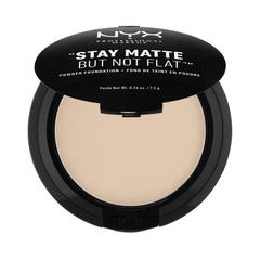 Base en polvo mate de NYX, compacto desnudo, acabado natural