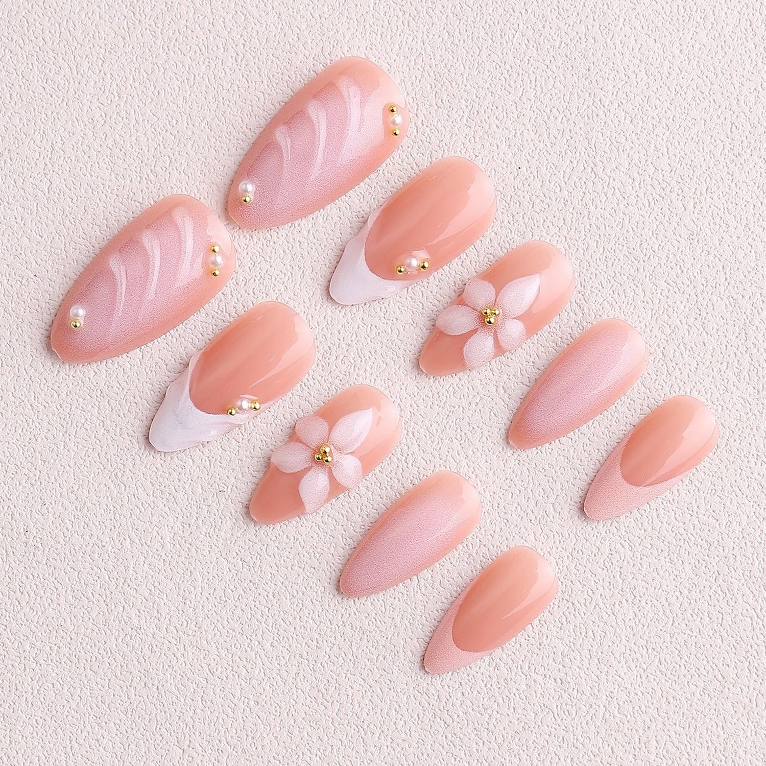 Uñas OCOUYVD con diseño 3D de flor y perla para ocasiones.