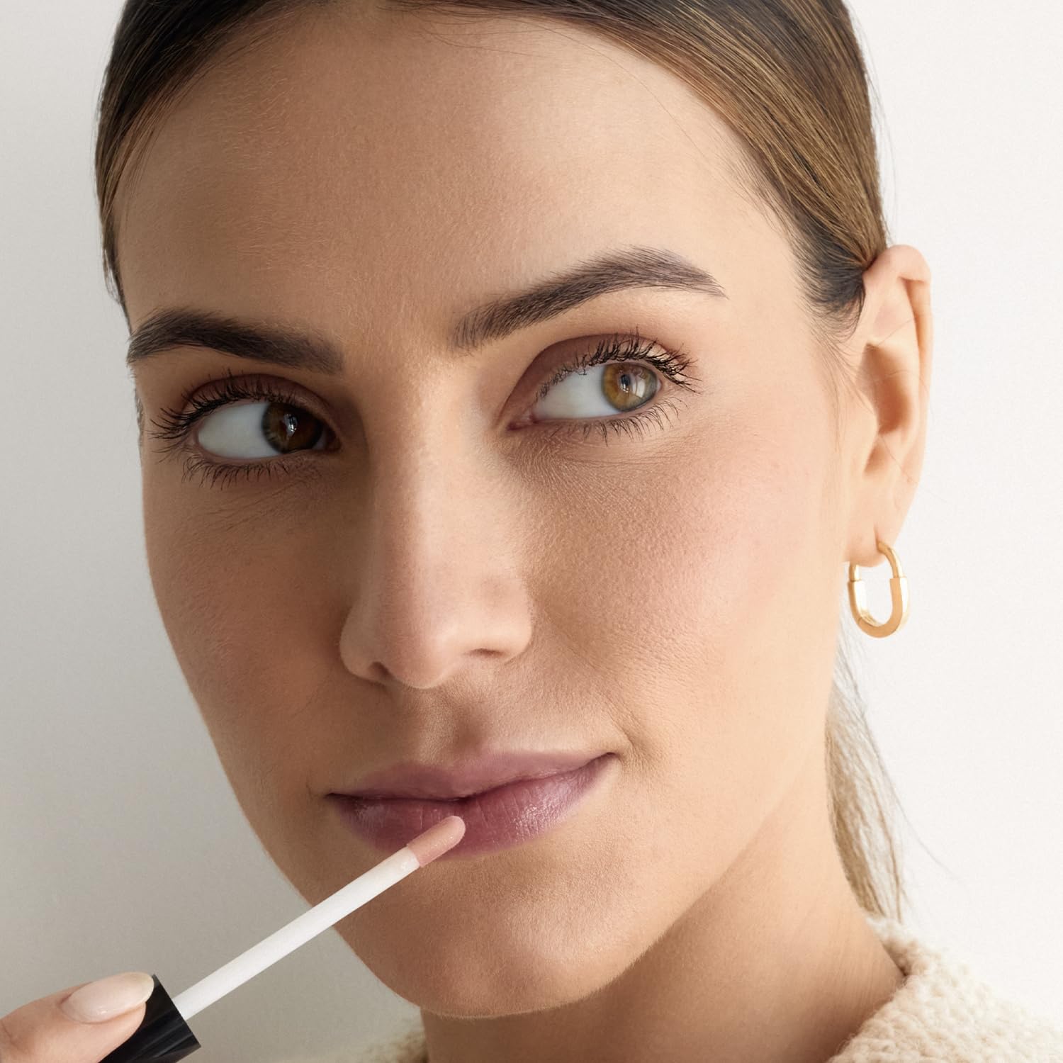 Palladio brillo labial minimiza arrugas superficiales y suaviza labios.