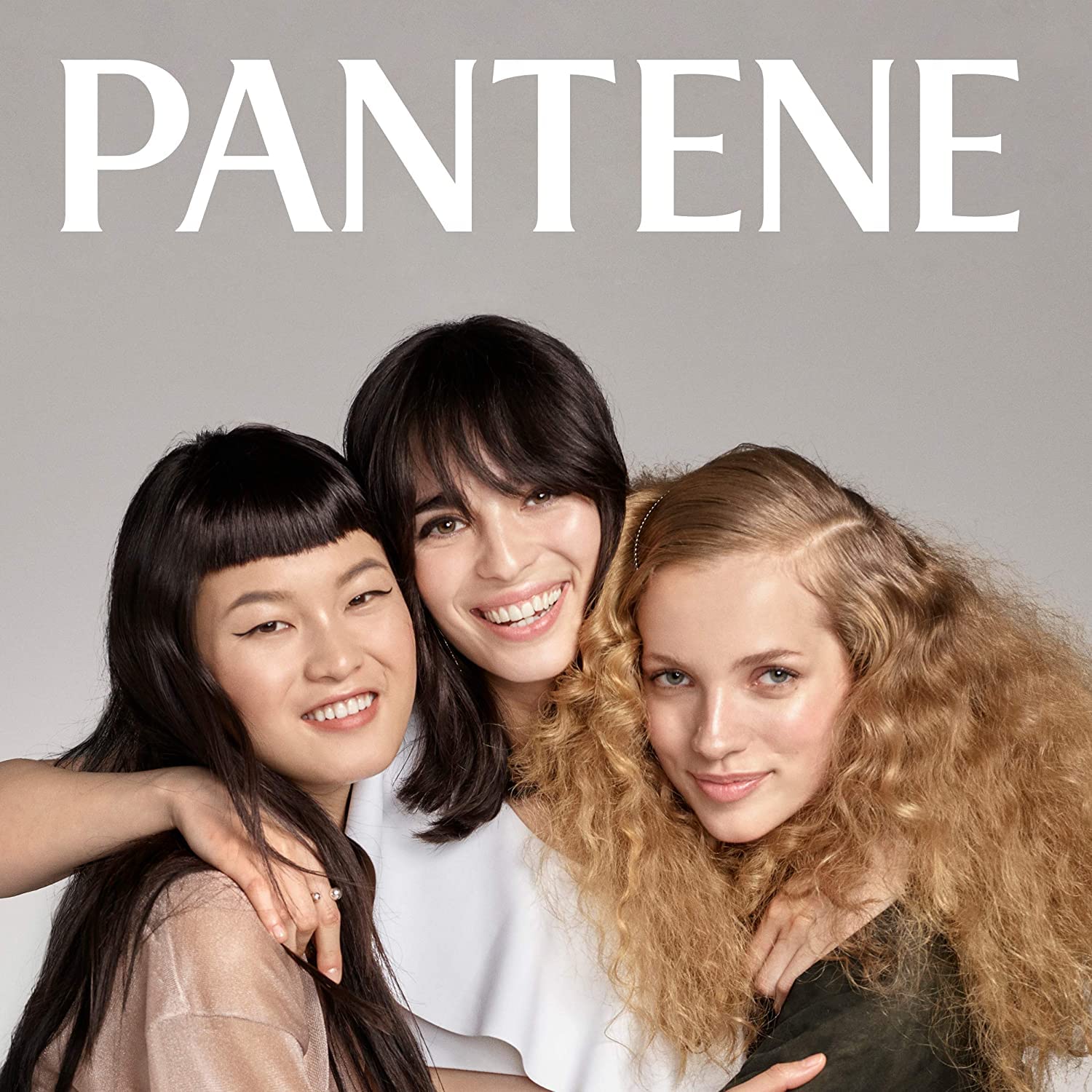 Acondicionador Pantene Pro-V para rizos, brillo saludable y suavidad.