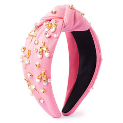 PANTIDE diadema bailarina con nudo superior rosa, ideal para looks elegantes.