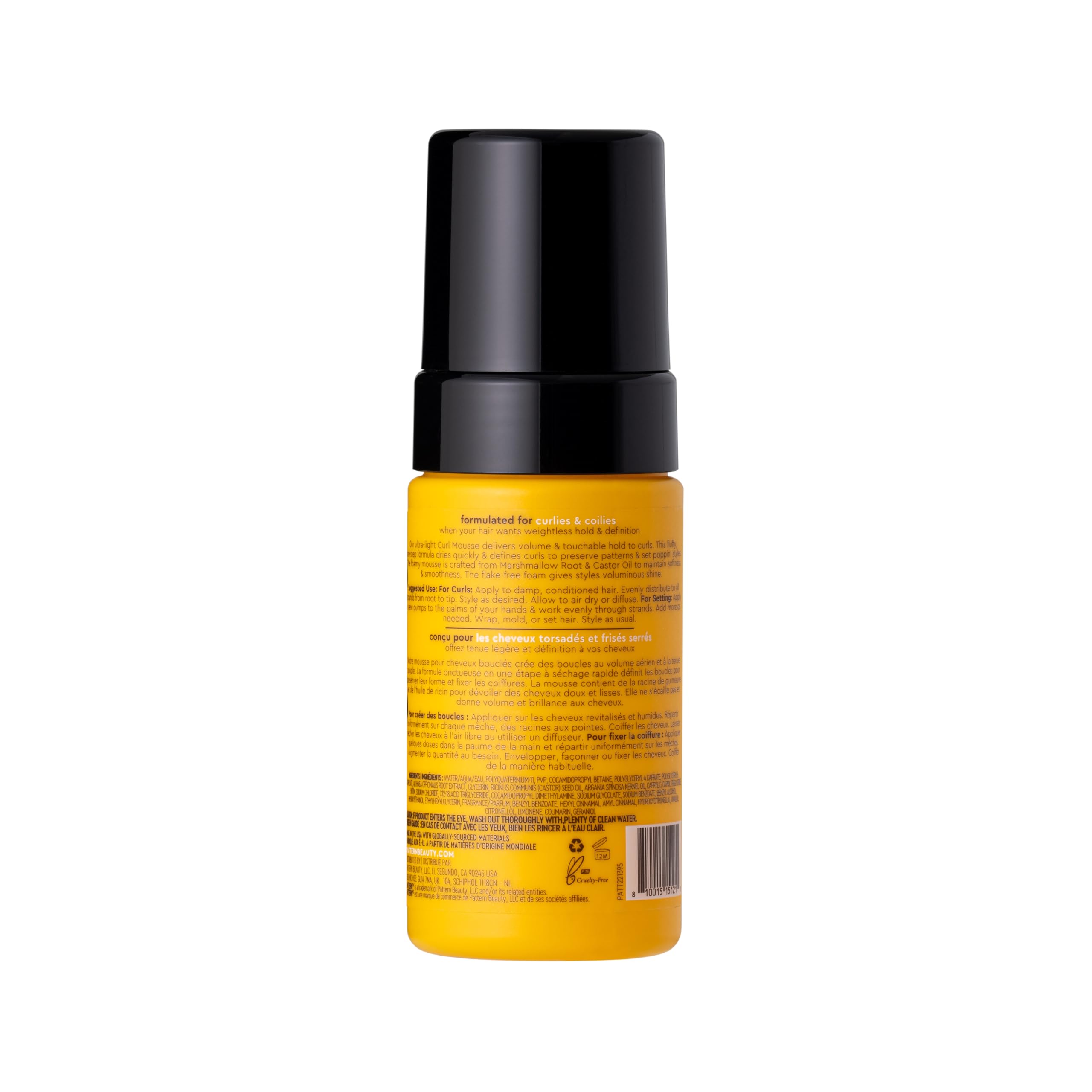 Close-up PATTERN mousse defines curls with shine and movement.