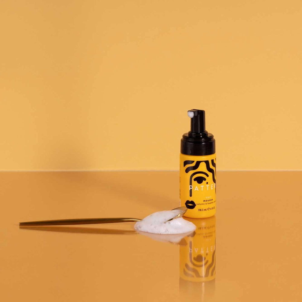 PATTERN mini curl mousse foam texture demonstrates soft hold without crunch.