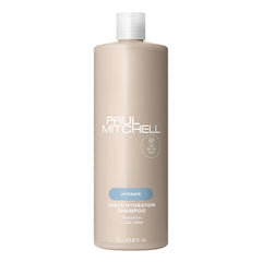 Paul Mitchell Champú Hidratación Pura: botella que sugiere hidratación para cabello seco