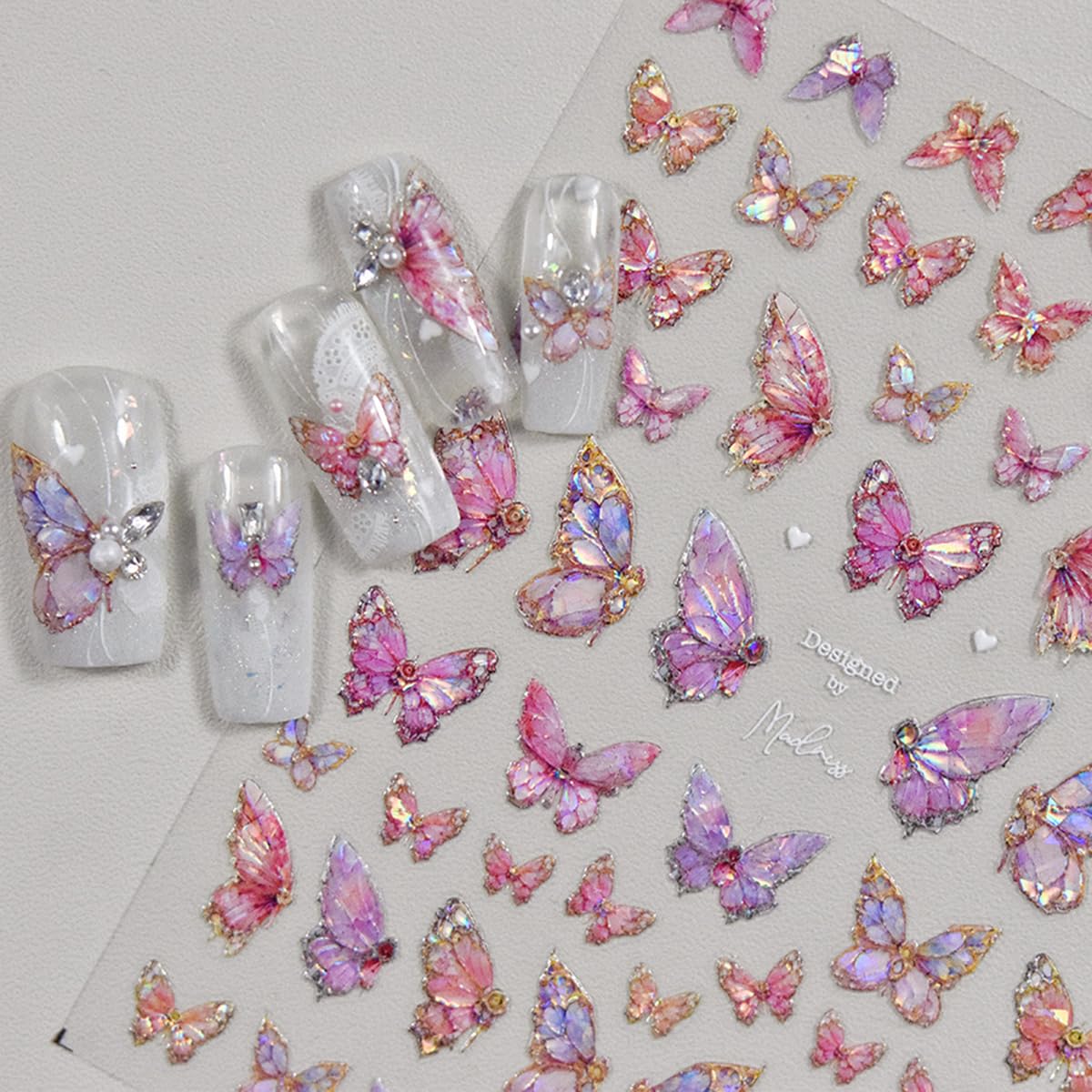 PowPop mariposas rosa relieve 5D en uñas, toque femenino.