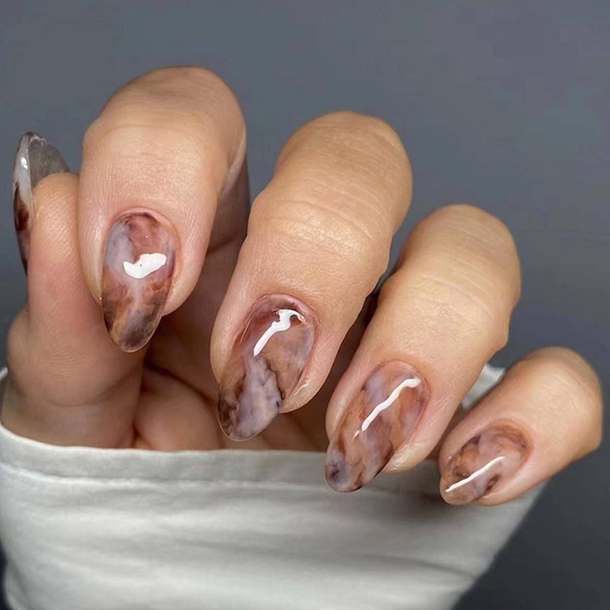 Uñas POWPOP para retirada en agua tibia con cuidado.
