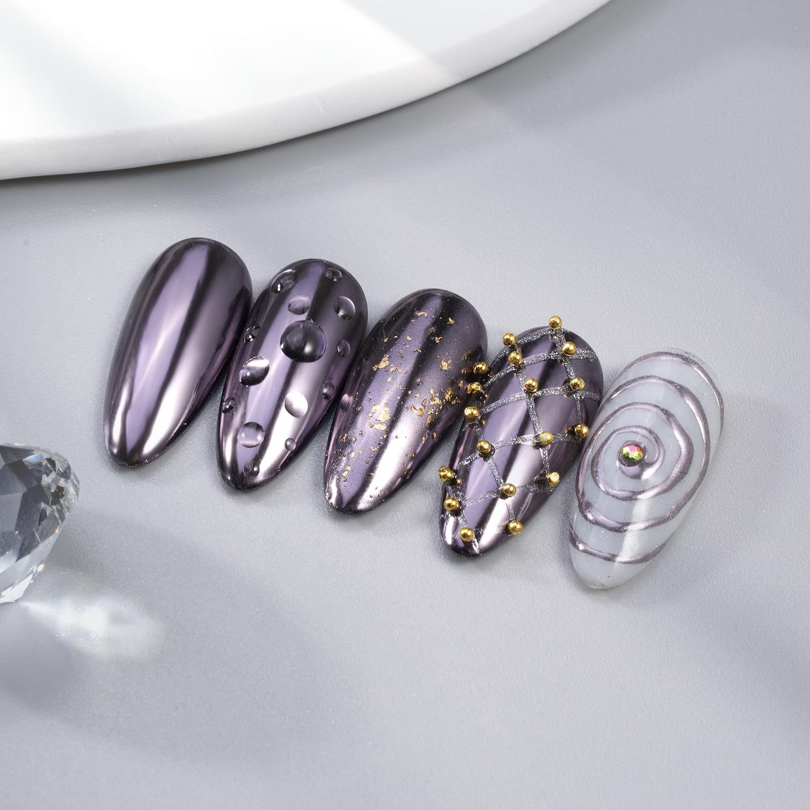 Pretty Diva chrome powder being applied on nails shows long-lasting, vibrant shimmer.