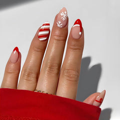 Uñas navideñas rojas de Puyokinm con copos de nieve, ideales para fiestas
