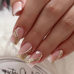 Puyokinm uñas postizas doradas, cuadradas y medianas con brillo para un look elegante.