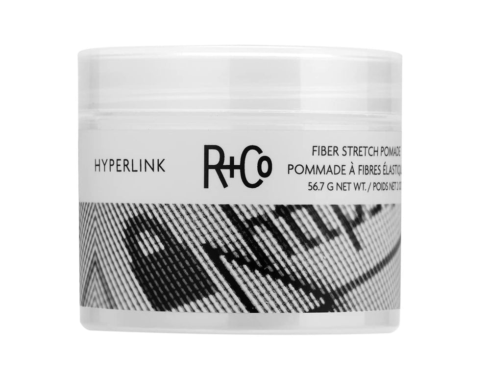 R+Co Hyperlink Fiber Stretch Pomade: bouteille élégante pour tenue légère et flexible.