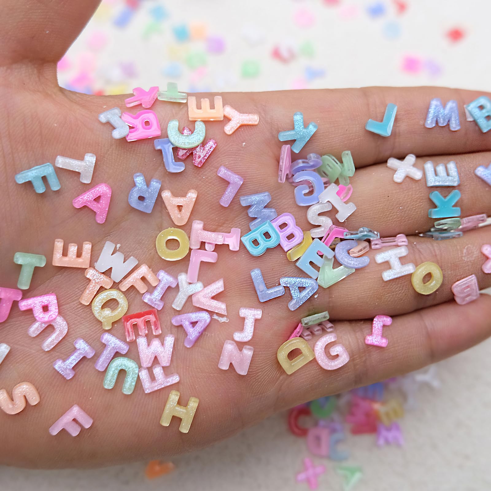 ROFIBUT letras resina candy color para manicuras divertidas y únicas.
