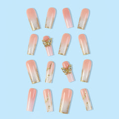 ROFIBUT Uñas doradas con ombré, acabado luminoso y elegante