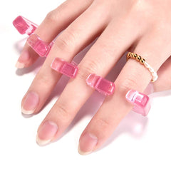 Rolabling espaciadores de pedicure para esmalte rosa ayudan a aplicar con precisión.