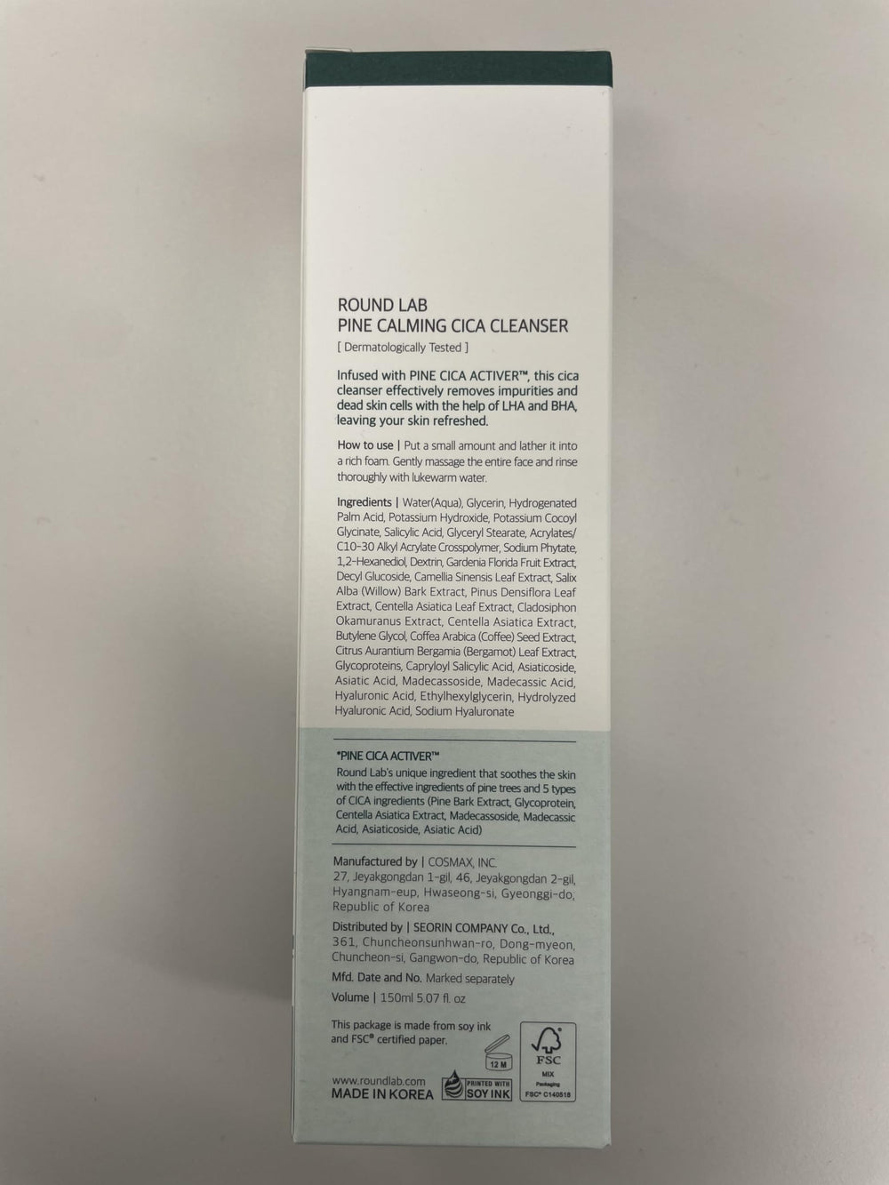 ROUND LAB Pine Calming Cica Cleanser caja y folleto informativo.