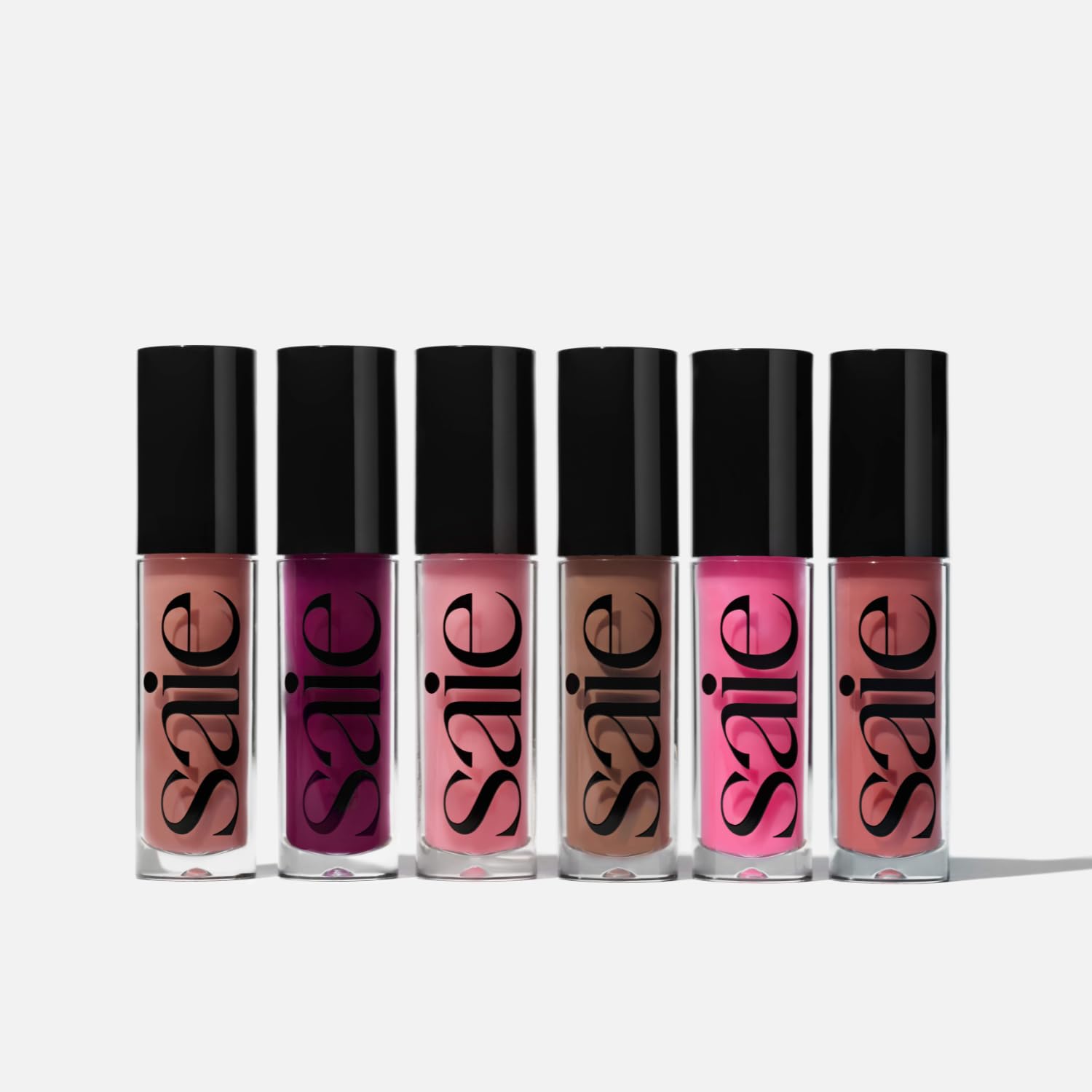 Saie GlossyBounce vegan formula with cruelty-free badge signals ethical lip care.