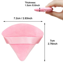 Puf triangular rosa Scartink, uso preciso junto a ojos para trazo limpio.