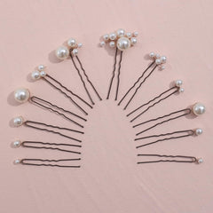 Detalle de perlas brillantes en los alfileres SELFCLOUD para un toque elegante.