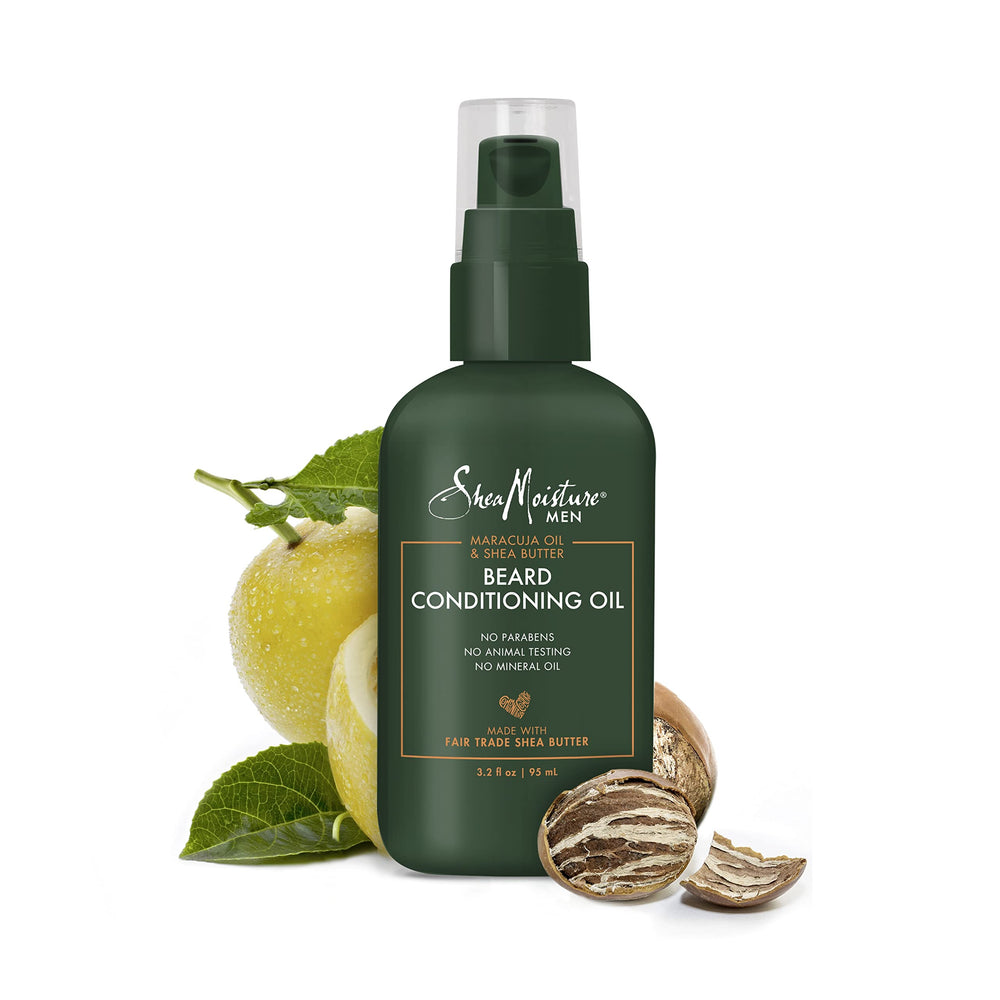 Aplicación de aceite para barba SheaMoisture en las manos, inicio del peinado.