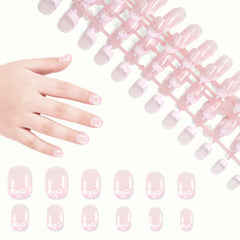 SIUSIO uñas infantiles francesas con lazo, opción elegante para fiestas y juego.
