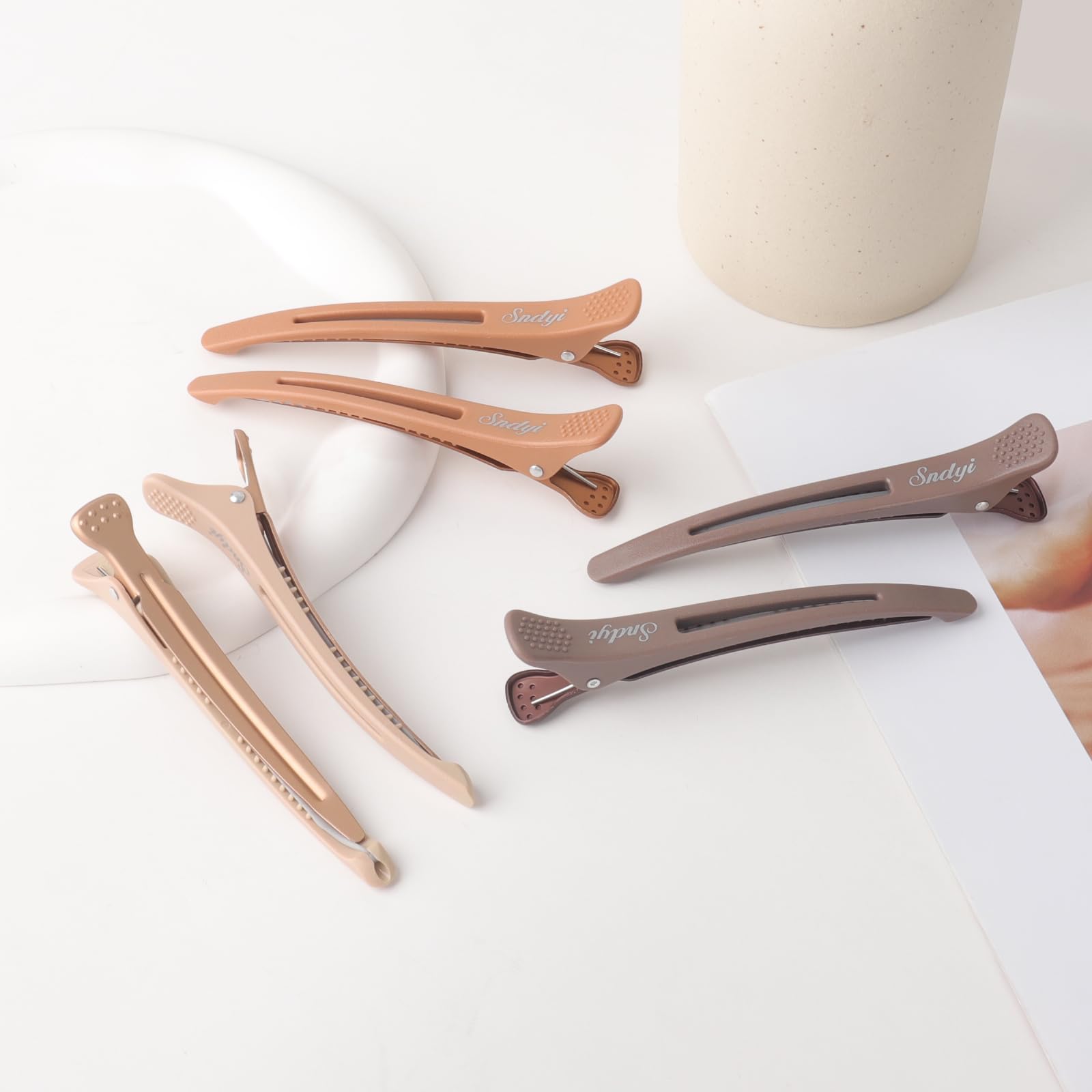 Sndyi clips para salón, uso profesional en cortes y coloración.