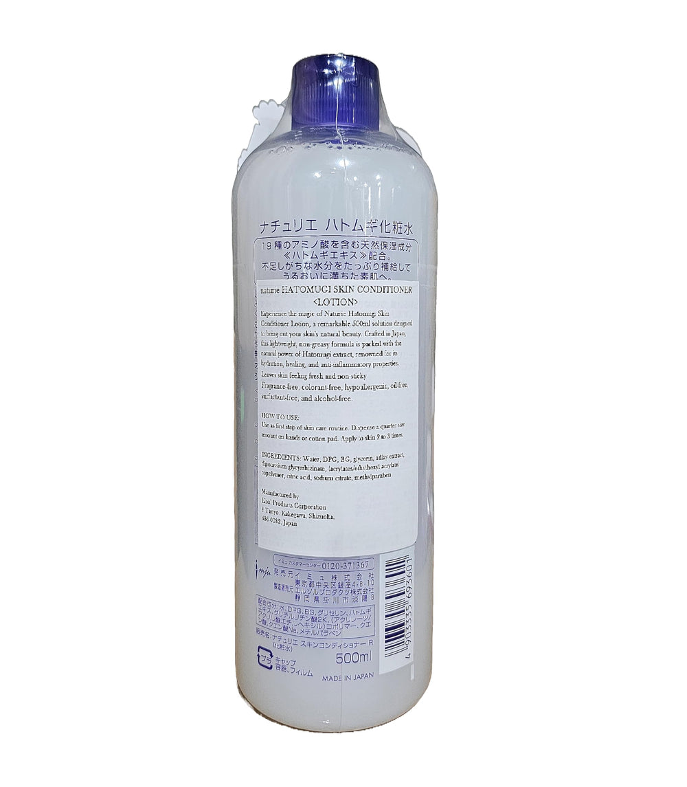 Close-up of Naturie Adlay lotion texture showing quick absorption.