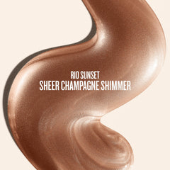 Sol de Janeiro Rio Sunset Glow Oil aplicándose con las manos, brillo cálido al instante.