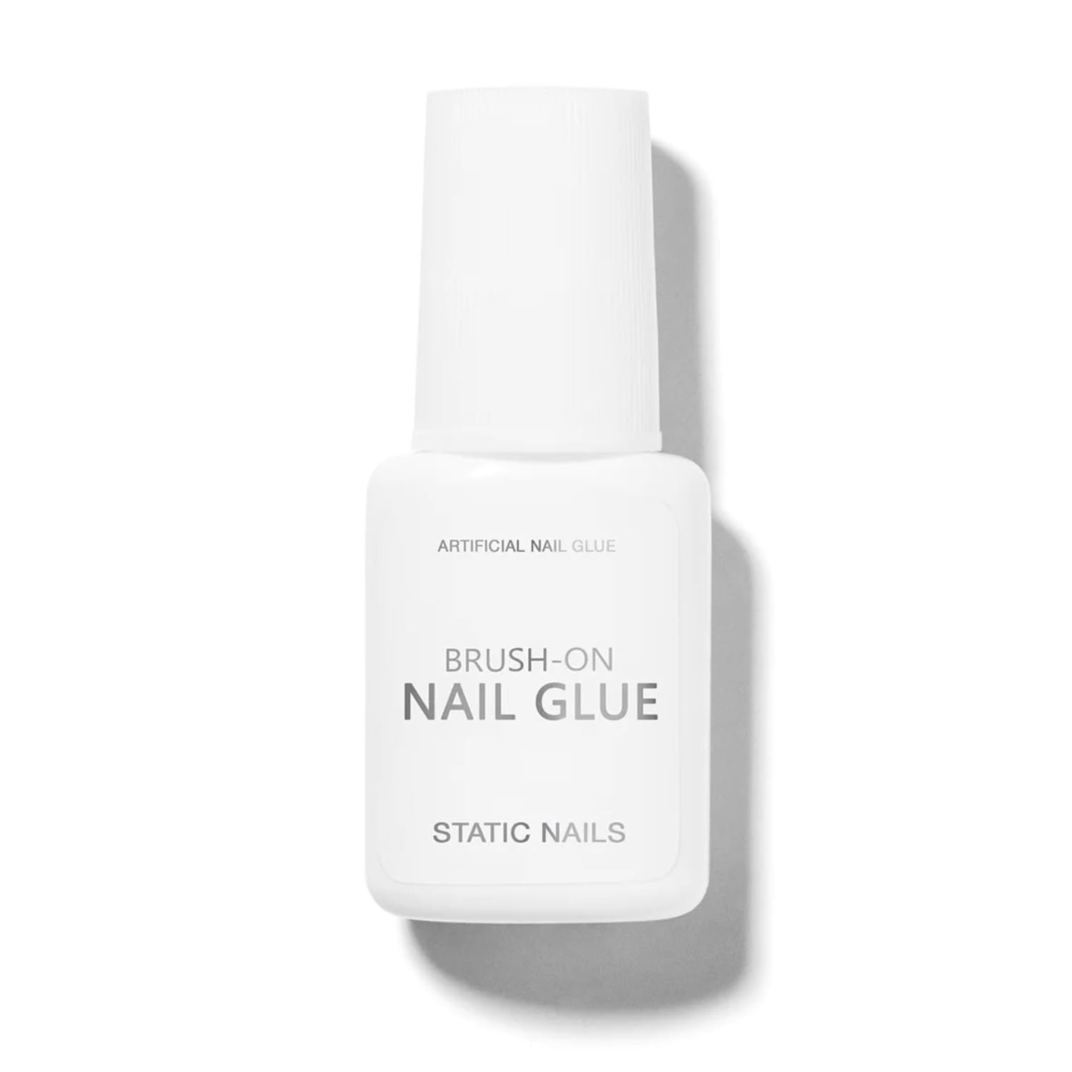 Static Nails pegamento para uñas con aplicador de pincel, aplicación limpia.