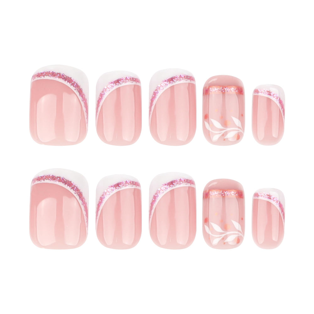 Uñas STBISEN pegables nude con punta francesa blanca y acabado lustroso.