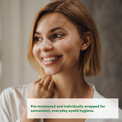 Systane Lid Wipes wipe texture close-up showing pre-moistened cleansing action.