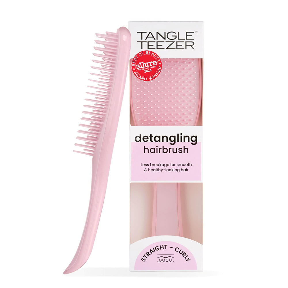 Cepillo desenredante Tangle Teezer rosa milenial para cabello suave sin tirones.