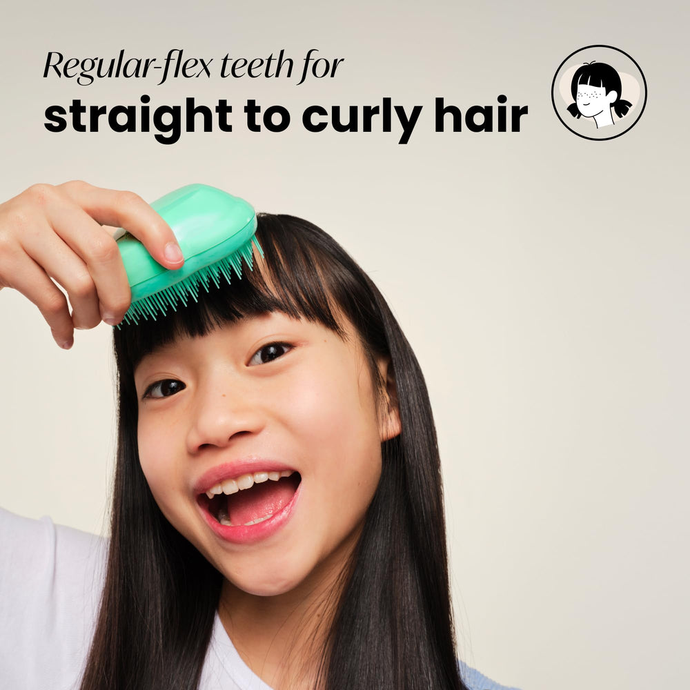 Cepillo mini Tangle Teezer Original con dientes cortos suaves para brillo sin frizz.