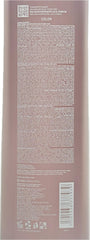 Espuma violeta de Lumina Champú neutralizando tonos amarillos en cabellos claros.