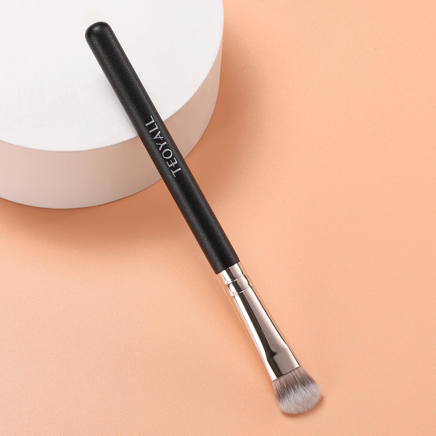 Teoyall diseño ergonómico para brocha de maquillaje de uso diario.
