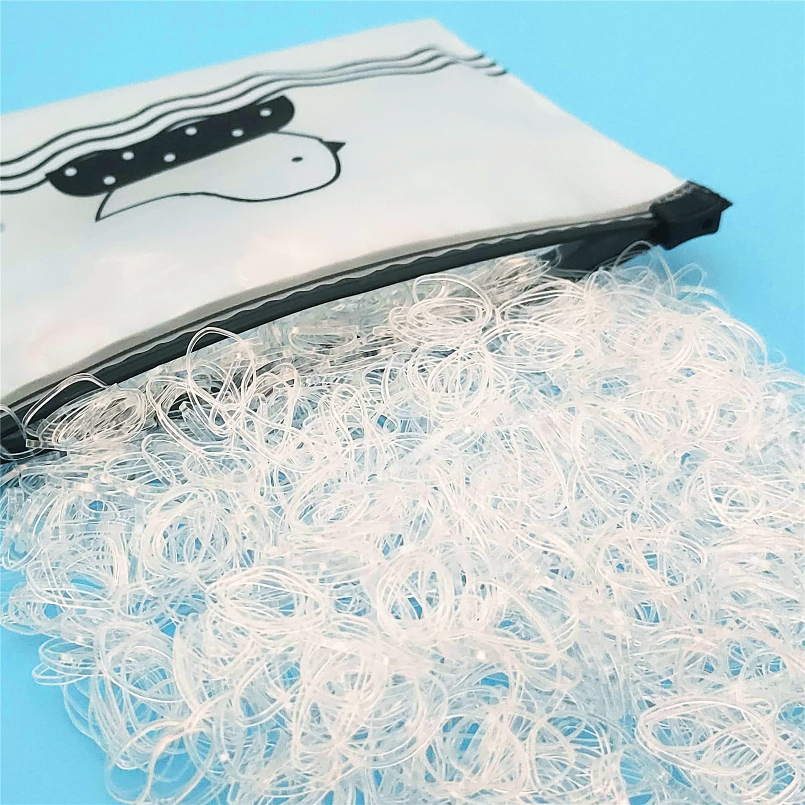 Bandas Tesvyns mini claras en paquete de 1500 para peinados rápidos.