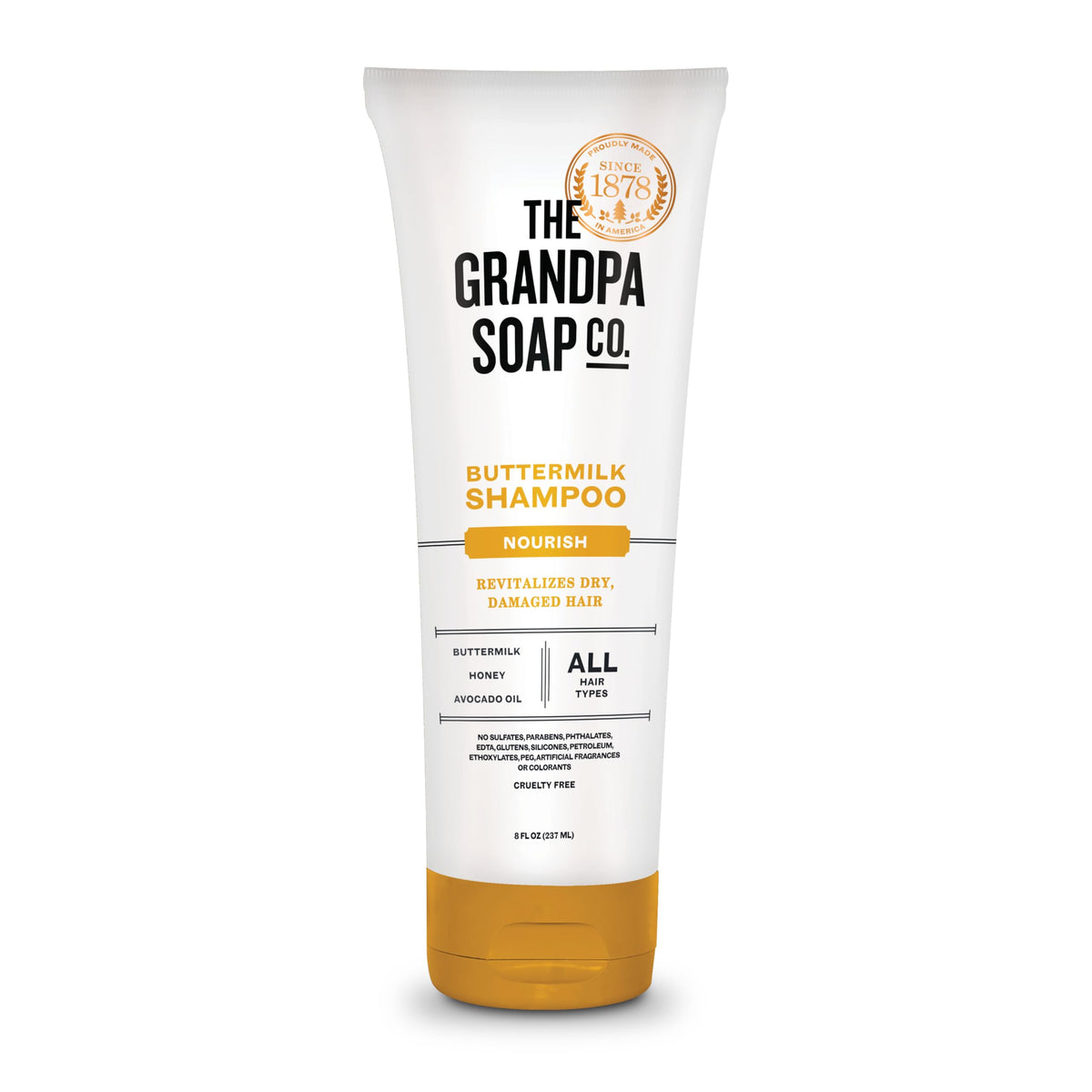 Champú Buttermilk de The Grandpa Soap Company: botella vertiendo para iniciar la rutina diaria.