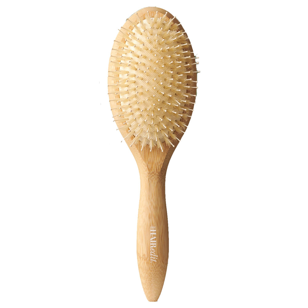 The Hair Edit Glossifier, cepillo de bambú con cerdas de jabalí, aporta brillo duradero.