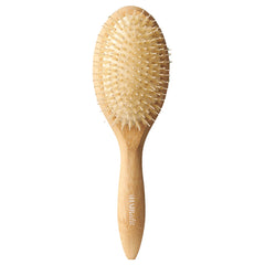 The Hair Edit Glossifier, cepillo de bambú con cerdas de jabalí, aporta brillo duradero.