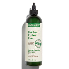 Champú suave de Thicker Fuller Hair en botella para limpieza delicada del cabello fino.